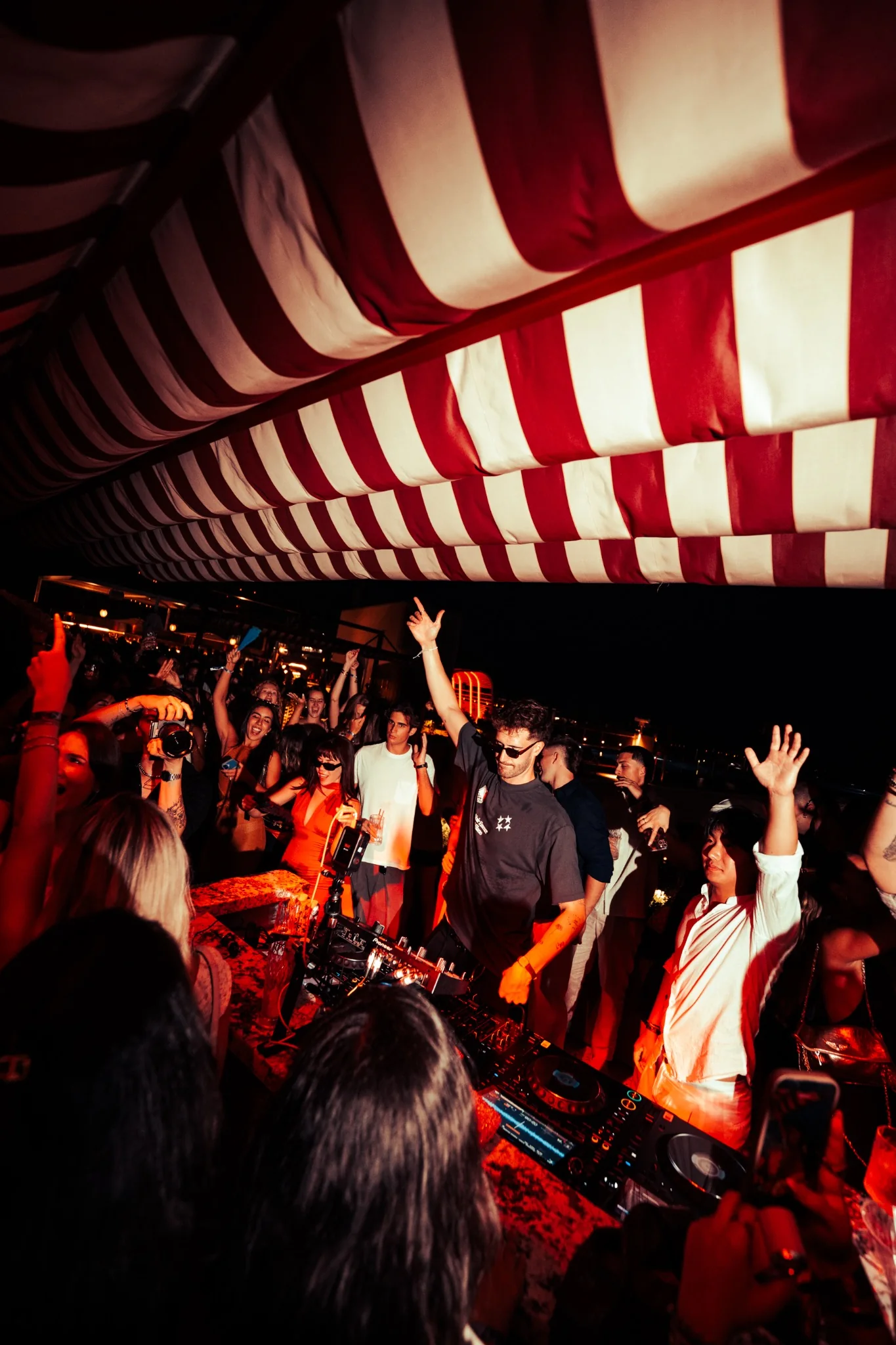 NOTJUST performing behind the decks